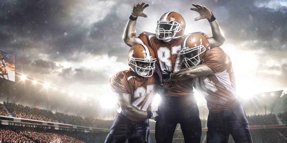 American football players celebrating a touchdown