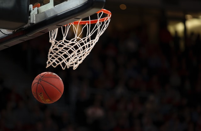 A ball coming out of the basket.